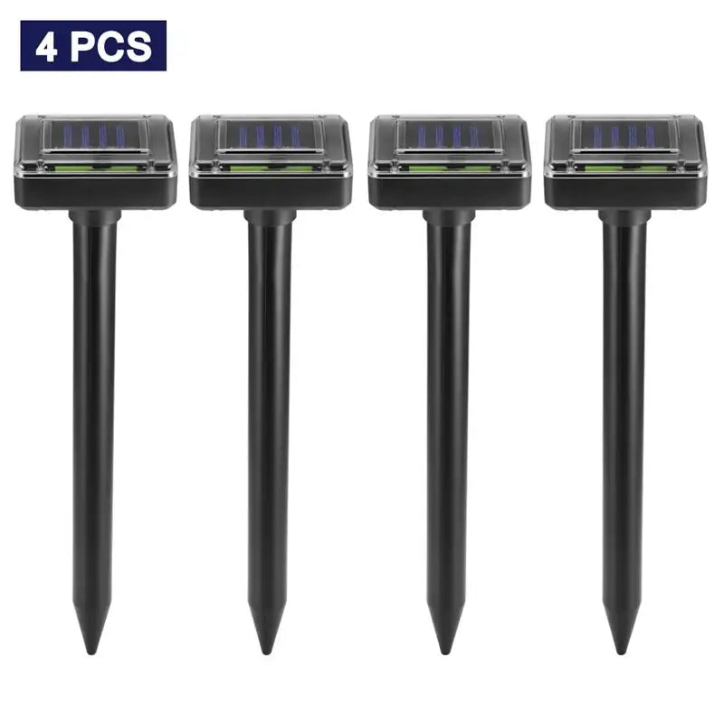 Lot de 4 répulsifs solaires à ultrasons pour souris, taupes et rongeurs, avec lampe LED intégrée pour jardin.